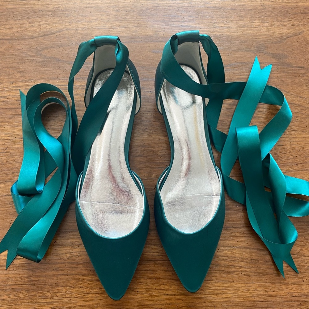 Emerald green satin flats with lace up ribbons. Pointed toe.